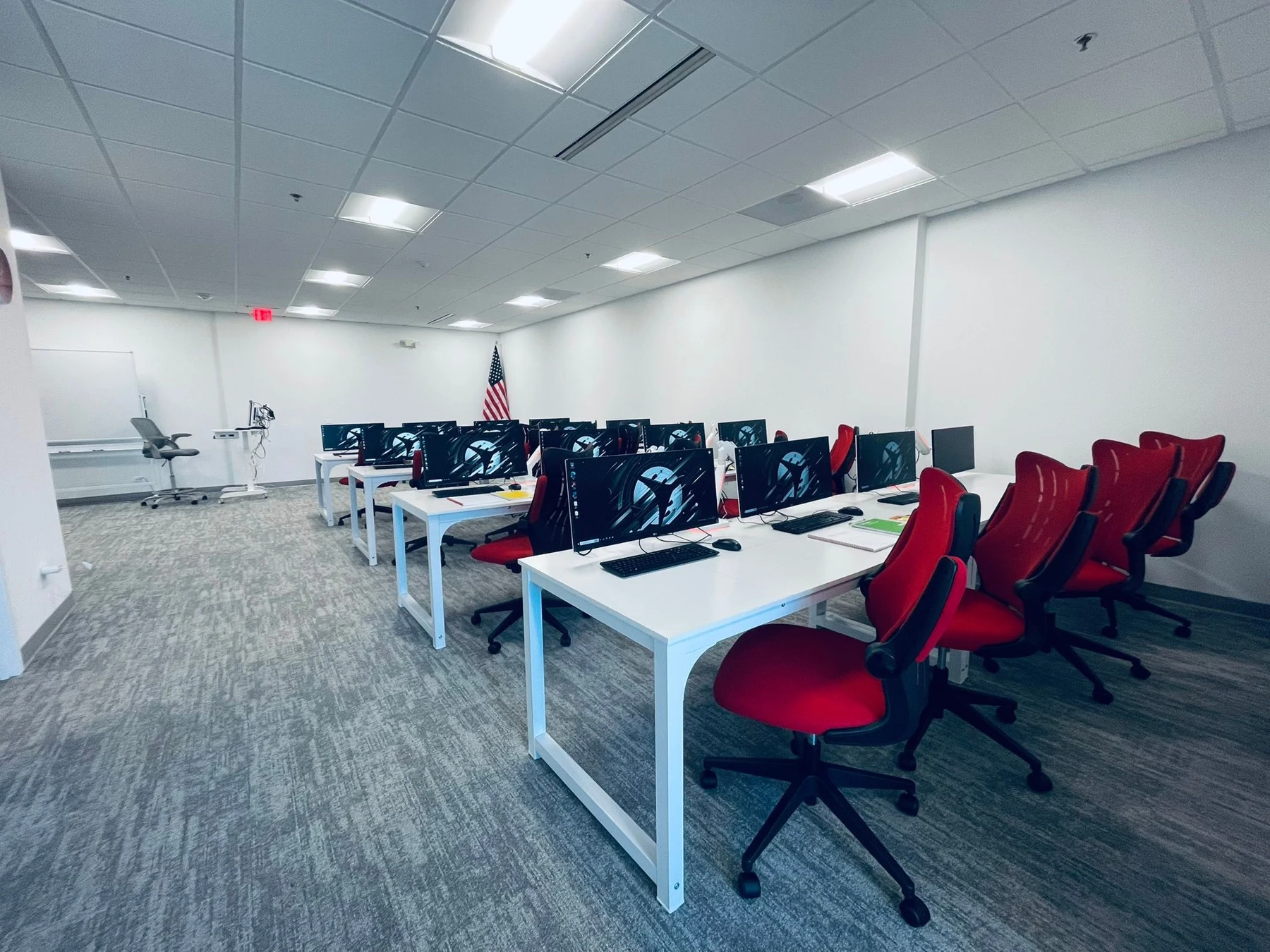 Eye-level view of a modern classroom with aviation training materials